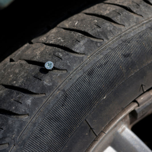 Flat Tire Service Near Ajax, Ontario. Nail in tire.
