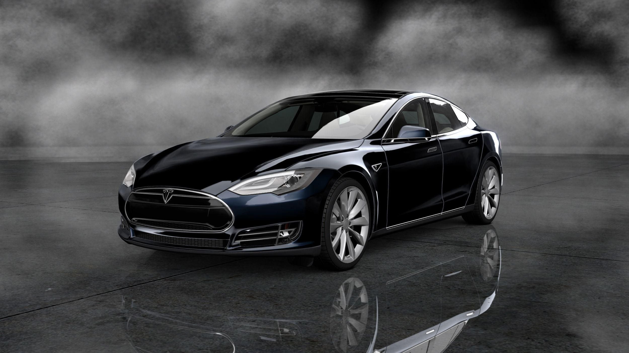 Mobile tire service banner showing a black Tesla Model S on a gray background.